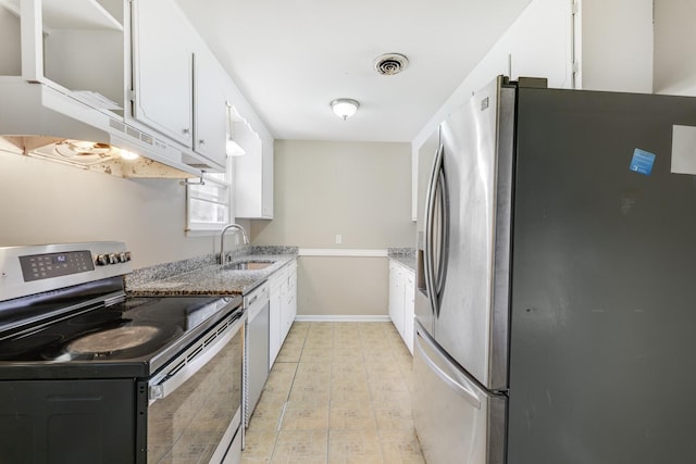 201 Sterry Ct, Antioch, TN 37013 - kitchen featuring appliances with stainless steel finishes, white cabinets, light stone counters, under cabinet range hood, and open shelves