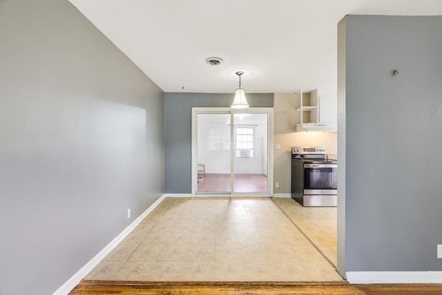 201 Sterry Ct, Antioch, TN 37013 - kitchen featuring stainless steel range with electric stovetop, under cabinet range hood, and decorative light fixtures