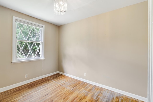 201 Sterry Ct, Antioch, TN 37013 - spare room with light wood finished floors and a chandelier