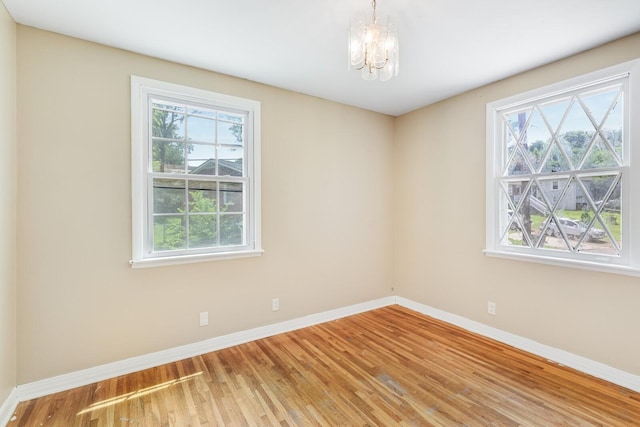 201 Sterry Ct, Antioch, TN 37013 - spare room featuring light wood-style floors and a chandelier