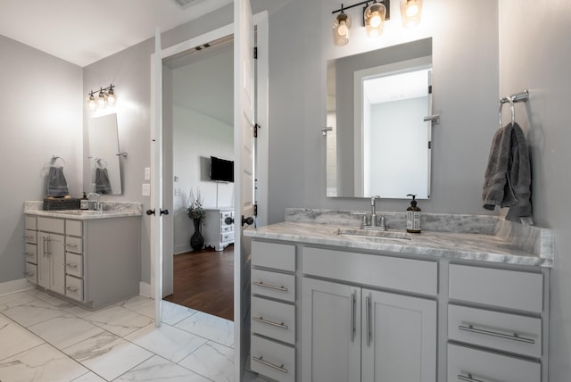 5726 Bridgemore Blvd, Murfreesboro, TN 37129 - bathroom featuring two vanities and marble finish floors