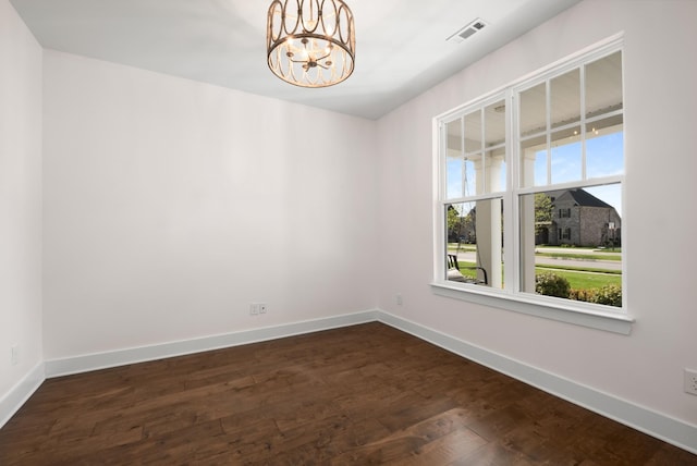 5726 Bridgemore Blvd, Murfreesboro, TN 37129 - spare room featuring healthy amount of natural light, a chandelier, and dark wood-type flooring