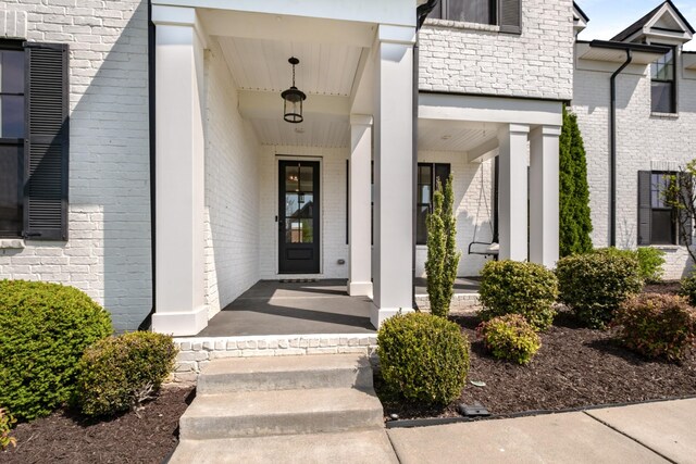 5726 Bridgemore Blvd, Murfreesboro, TN 37129 - doorway to property featuring a porch and brick siding