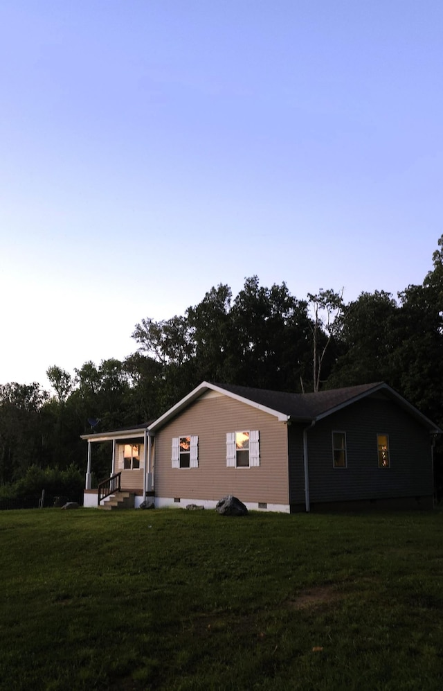 145 Michelle Ln, Winchester, TN 37398 - back of property featuring a yard and view of wooded area