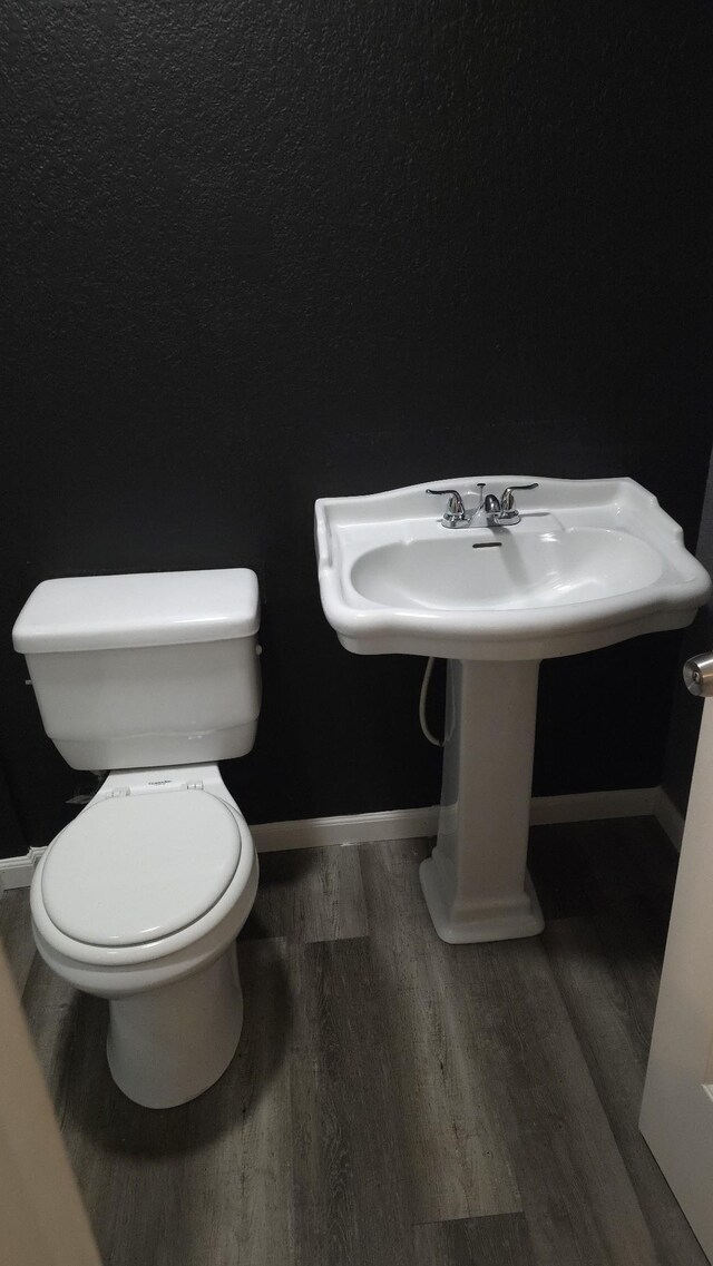 145 Michelle Ln, Winchester, TN 37398 - half bath featuring toilet and wood finished floors