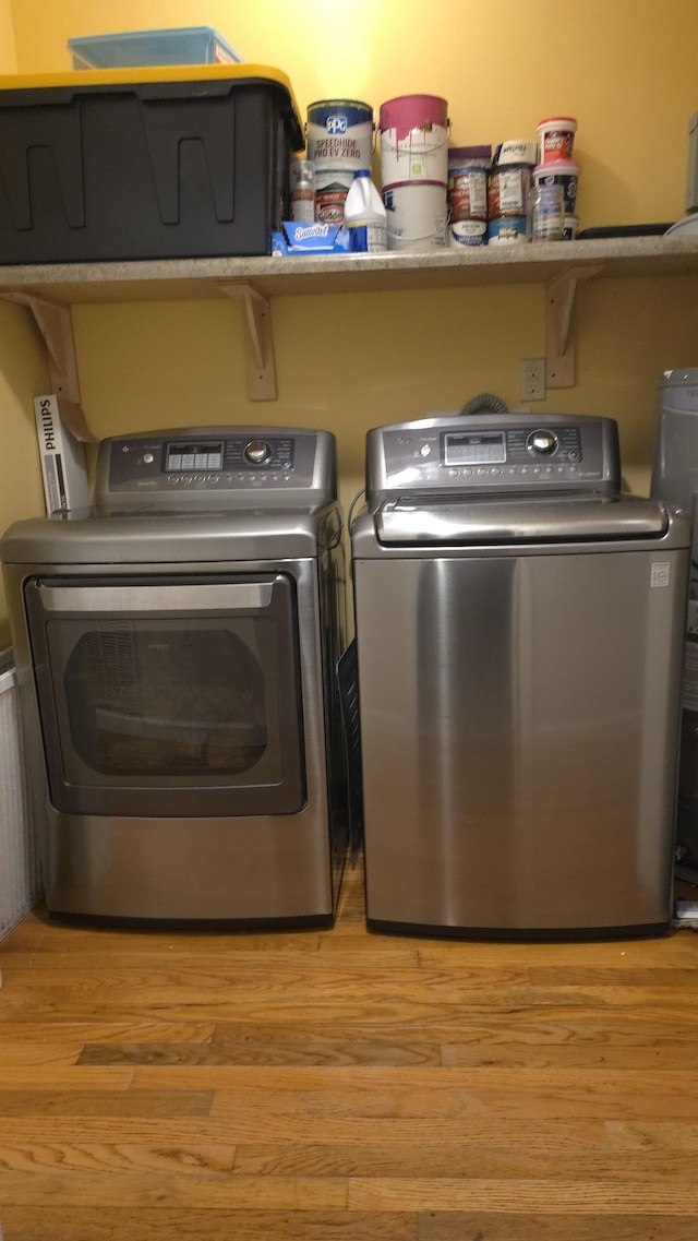 145 Michelle Ln, Winchester, TN 37398 - laundry room featuring washer and dryer and light wood finished floors