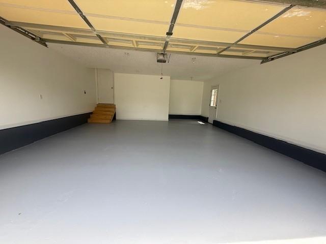 2750 Shepherds Ct, Woodlawn, TN 37191 - garage with a garage door opener