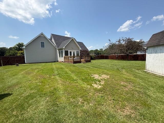 2750 Shepherds Ct, Woodlawn, TN 37191 - back of house with a fenced backyard and a wooden deck