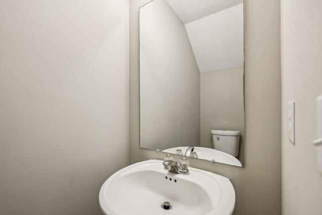 5428 Cedar Ash Xing, Antioch, TN 37013 - half bath with a sink and vaulted ceiling