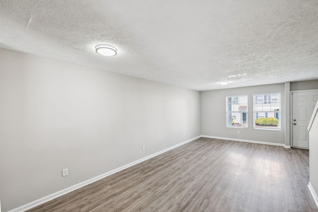 5428 Cedar Ash Xing, Antioch, TN 37013 - spare room with wood finished floors and a textured ceiling