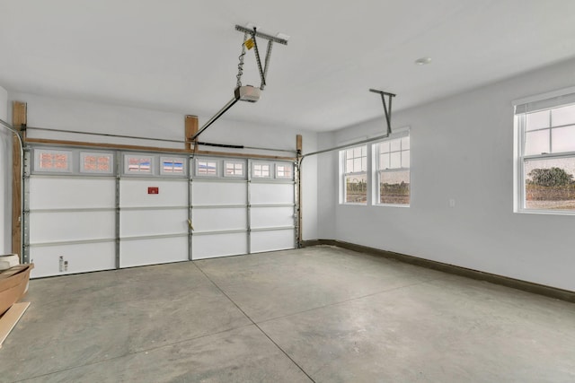 510 Hinton St, Lebanon, TN 37090 - garage featuring a garage door opener and baseboards