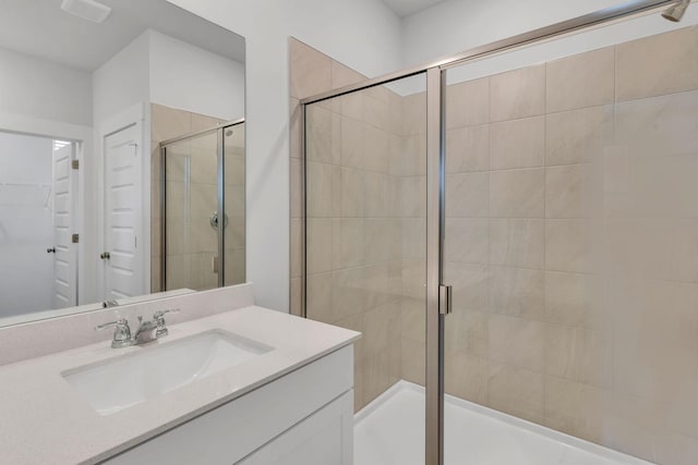 510 Hinton St, Lebanon, TN 37090 - bathroom featuring vanity, a shower stall, and a spacious closet