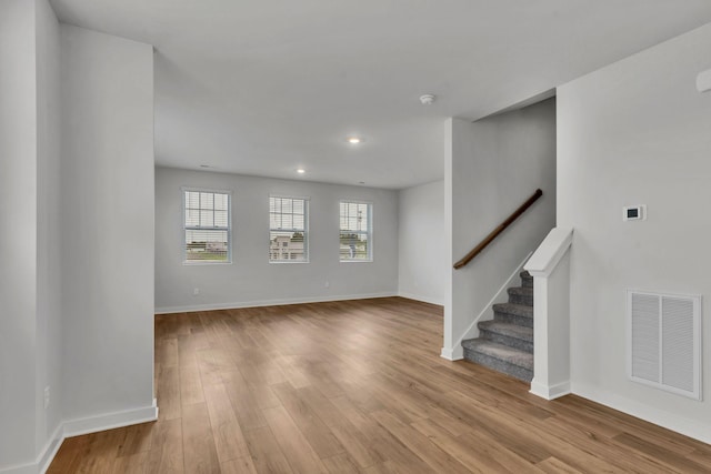 510 Hinton St, Lebanon, TN 37090 - unfurnished living room with wood finished floors, stairs, and recessed lighting