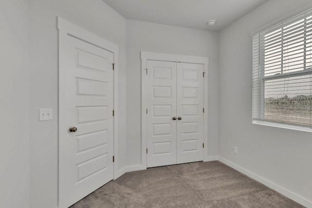 510 Hinton St, Lebanon, TN 37090 - unfurnished bedroom with carpet flooring, multiple windows, and a closet