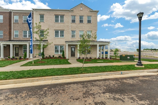 510 Hinton St, Lebanon, TN 37090 - townhome / multi-family property with a front yard and brick siding