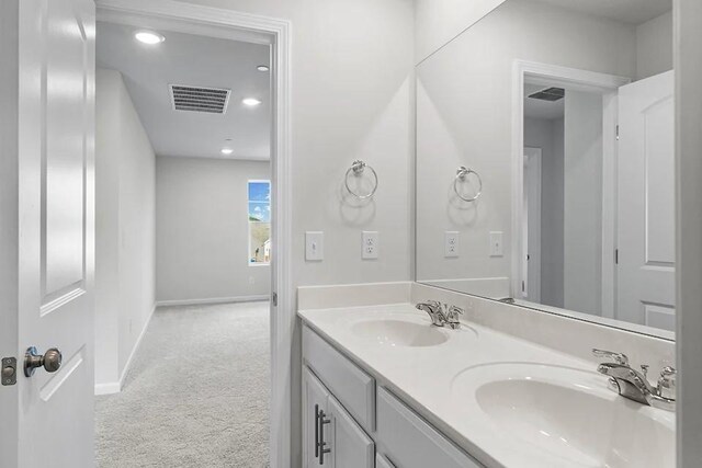 2502 Beverly Gail Rd, Pleasant View, TN 37146 - bathroom featuring double vanity and recessed lighting