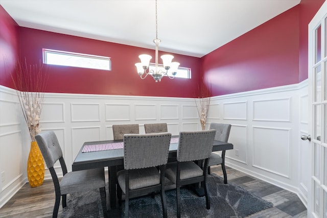 509 Eagleview Dr, Eagleville, TN 37060 - dining room featuring a decorative wall, a chandelier, wainscoting, plenty of natural light, and dark wood-style floors