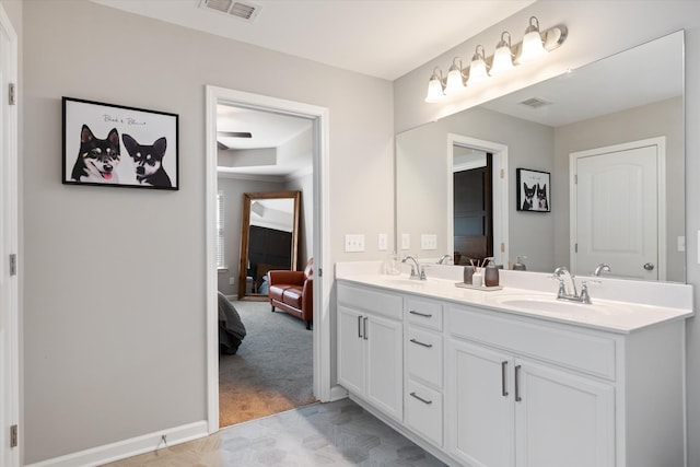 509 Eagleview Dr, Eagleville, TN 37060 - ensuite bathroom featuring double vanity and baseboards