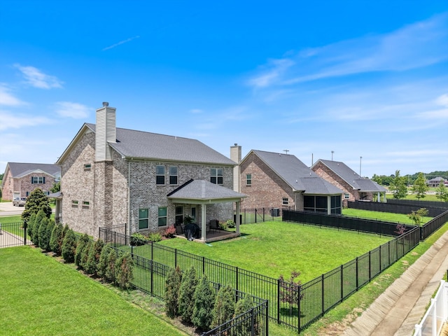 509 Eagleview Dr, Eagleville, TN 37060 - rear view of house featuring brick siding, a chimney, and a fenced backyard