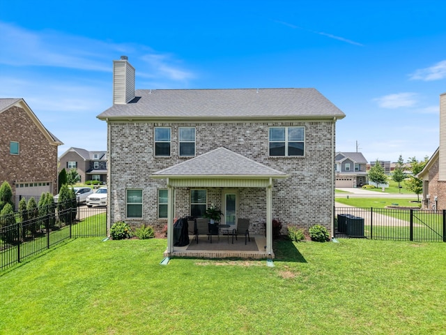 509 Eagleview Dr, Eagleville, TN 37060 - back of house featuring a chimney, a fenced backyard, brick siding, and a patio