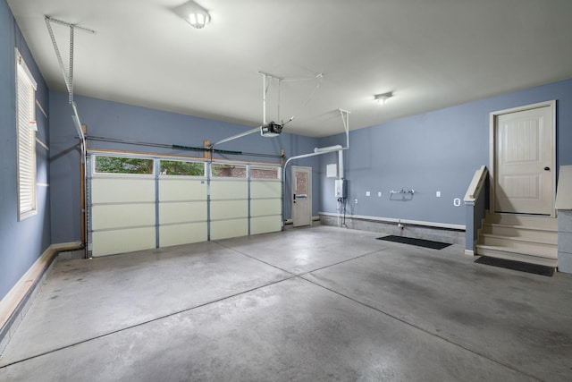 1118 Averwater Run, Murfreesboro, TN 37128 - garage featuring a garage door opener and baseboards