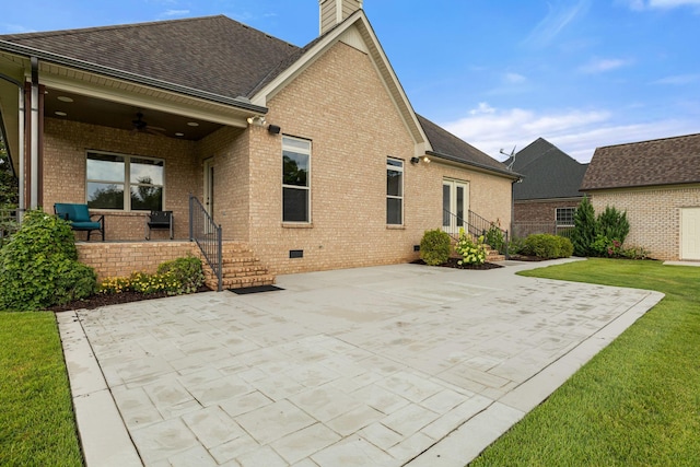1118 Averwater Run, Murfreesboro, TN 37128 - back of house with ceiling fan, a patio, brick siding, and a lawn