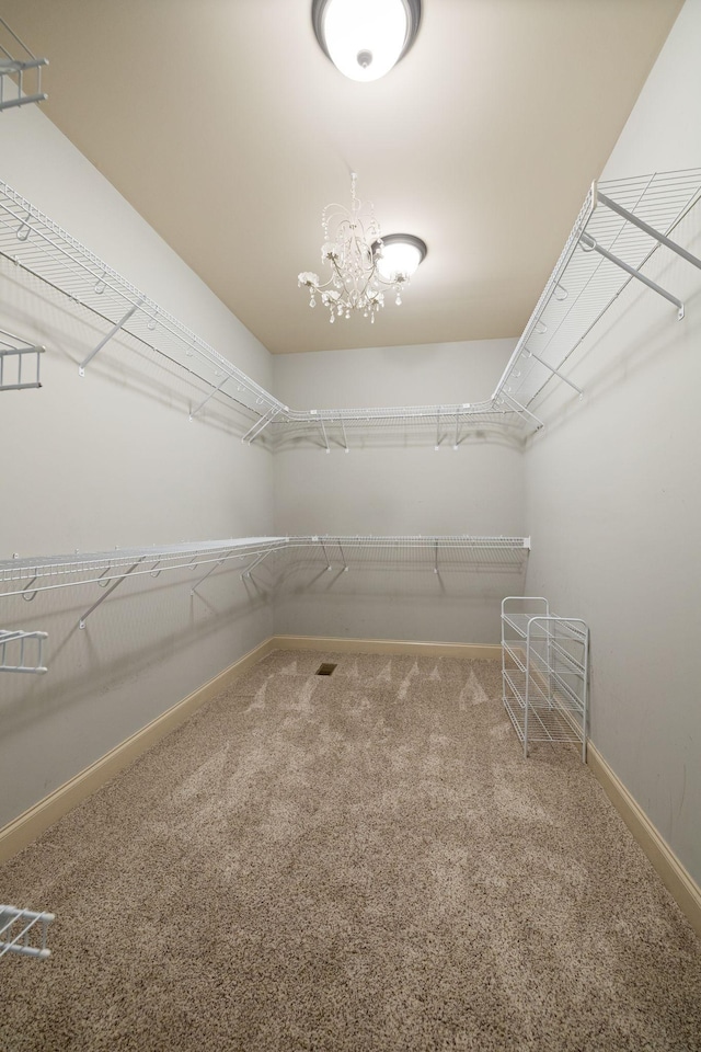 1118 Averwater Run, Murfreesboro, TN 37128 - spacious closet featuring carpet floors and a chandelier