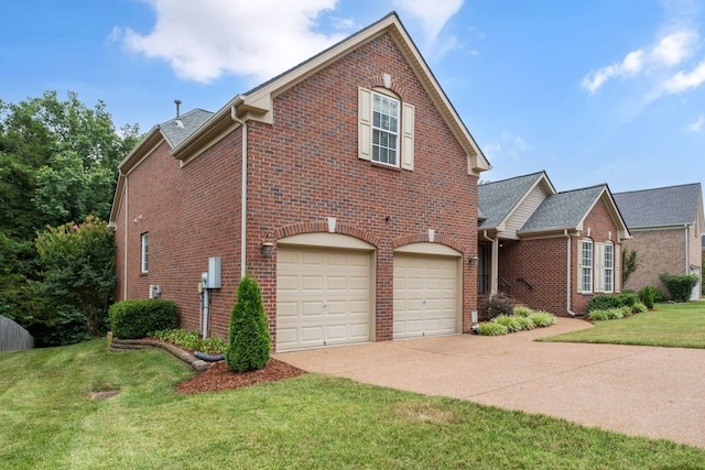 225 Cobblestone Lndg, Mount Juliet, TN 37122 - view of front of home featuring brick siding, driveway, an attached garage, a front yard, and a shingled roof