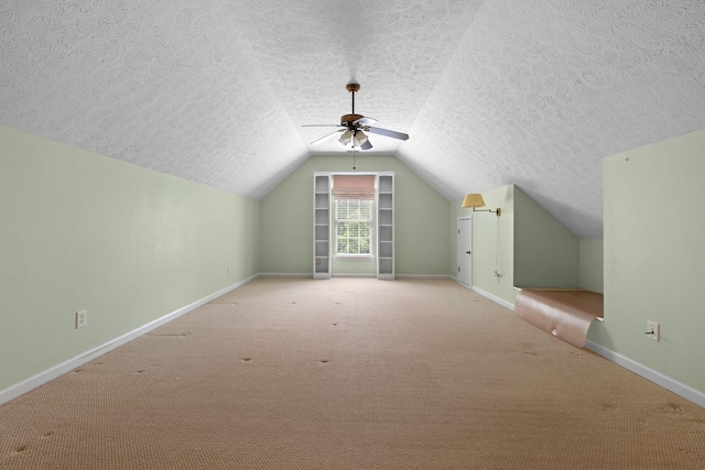 225 Cobblestone Lndg, Mount Juliet, TN 37122 - additional living space featuring a textured ceiling, vaulted ceiling, carpet floors, and ceiling fan