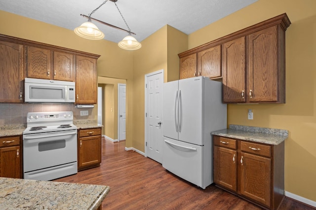 225 Cobblestone Lndg, Mount Juliet, TN 37122 - kitchen with white appliances, dark wood finished floors, backsplash, and brown cabinetry