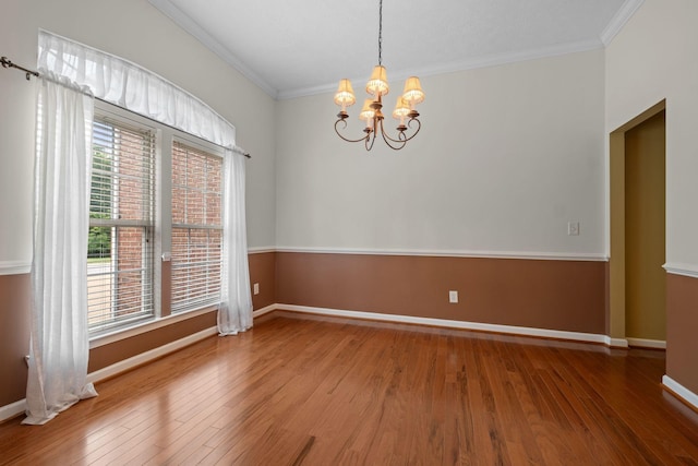 225 Cobblestone Lndg, Mount Juliet, TN 37122 - spare room with a chandelier, wood finished floors, and ornamental molding
