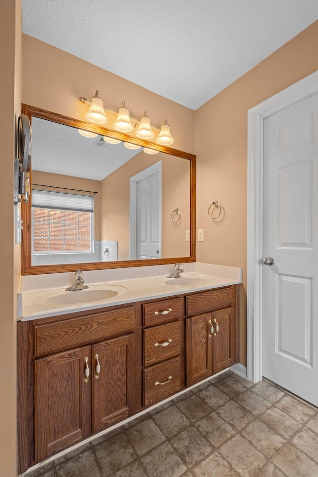 225 Cobblestone Lndg, Mount Juliet, TN 37122 - full bathroom with double vanity and a textured ceiling