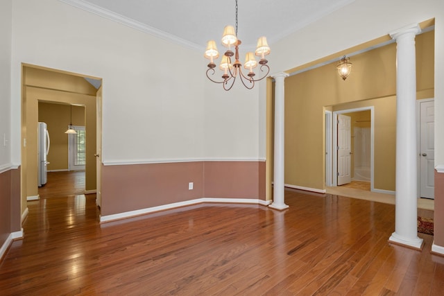 225 Cobblestone Lndg, Mount Juliet, TN 37122 - unfurnished room featuring ornamental molding, wood finished floors, a chandelier, and ornate columns