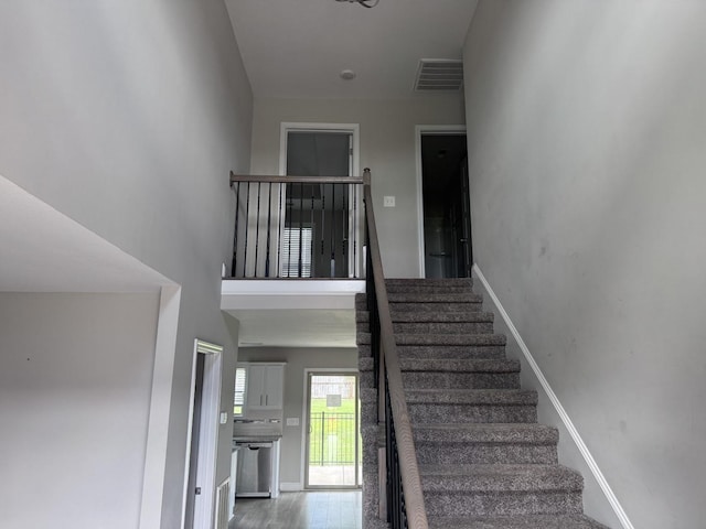 1175 Ewing Way, Clarksville, TN 37043 - staircase with baseboards and wood finished floors