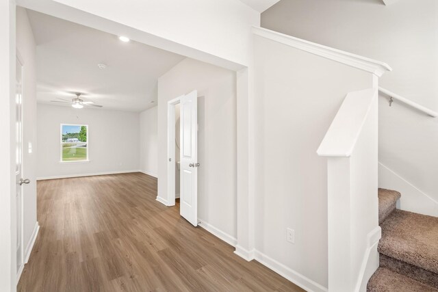 2047 Lala Loop, White Bluff, TN 37187 - corridor with wood finished floors and stairs