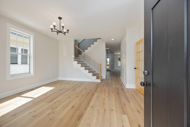 403 Boren St, Springfield, TN 37172 - foyer featuring a chandelier, light wood finished floors, stairway, and recessed lighting