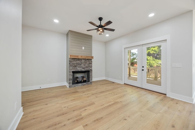403 Boren St, Springfield, TN 37172 - unfurnished living room featuring light wood finished floors, ceiling fan, a fireplace, french doors, and recessed lighting