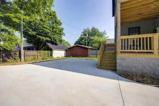 403 Boren St, Springfield, TN 37172 - view of patio with a storage unit and stairway
