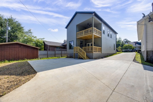 403 Boren St, Springfield, TN 37172 - modern home featuring a balcony, concrete driveway, and a ceiling fan