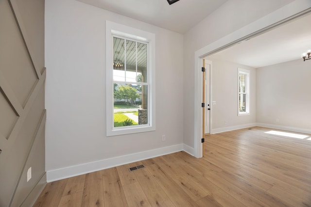403 Boren St, Springfield, TN 37172 - spare room with a chandelier and light wood-style floors