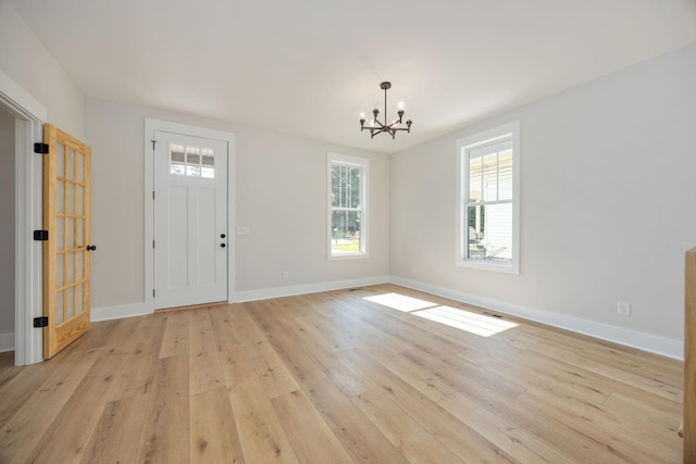 403 Boren St, Springfield, TN 37172 - foyer featuring a chandelier and light wood-style flooring