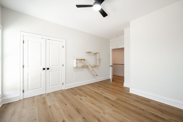 1015 Amelia Ct, Chattanooga, TN 37412 - unfurnished bedroom with wood finished floors, a closet, and a ceiling fan