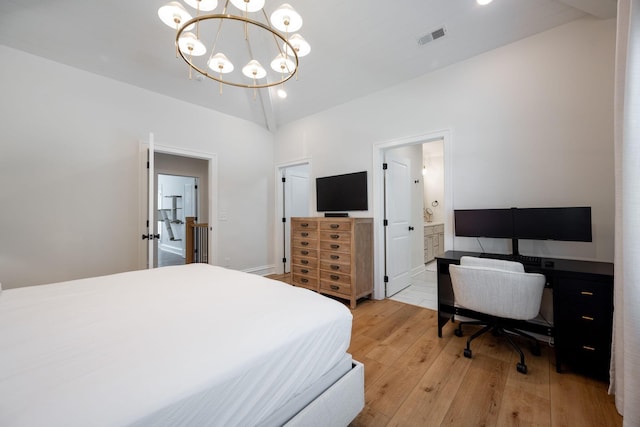 1015 Amelia Ct, Chattanooga, TN 37412 - bedroom with light wood finished floors, a chandelier, lofted ceiling, an office area, and ensuite bath