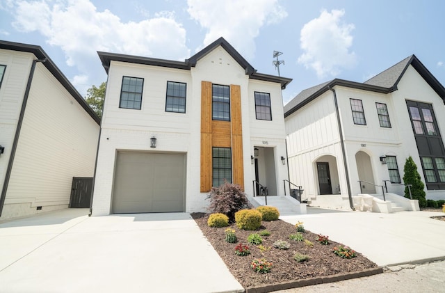 1015 Amelia Ct, Chattanooga, TN 37412 - view of front of house featuring concrete driveway, a garage, and brick siding