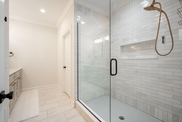 1015 Amelia Ct, Chattanooga, TN 37412 - bathroom featuring a shower stall, vanity, recessed lighting, ornamental molding, and tile patterned flooring