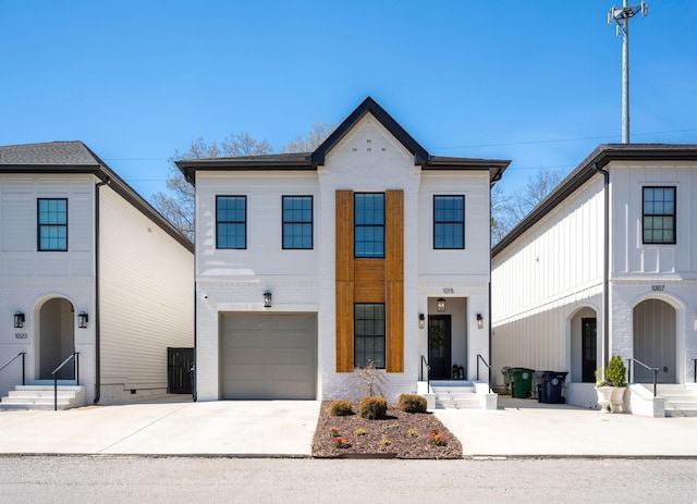 1015 Amelia Ct, Chattanooga, TN 37412 - view of front of property with concrete driveway, brick siding, and an attached garage