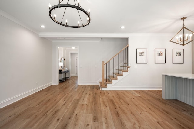 1015 Amelia Ct, Chattanooga, TN 37412 - foyer entrance with a chandelier, stairs, ornamental molding, light wood-style floors, and recessed lighting