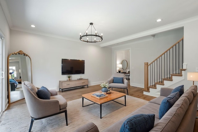 1015 Amelia Ct, Chattanooga, TN 37412 - living room featuring a chandelier, light wood finished floors, recessed lighting, crown molding, and arched walkways