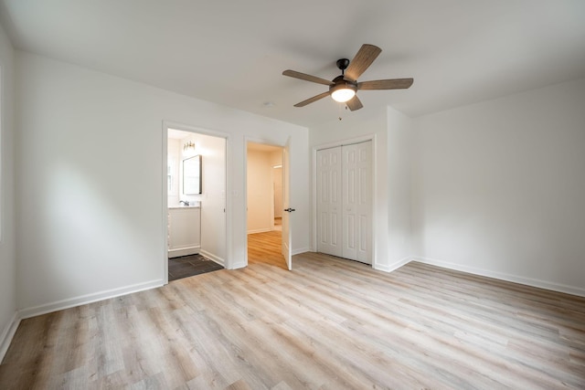 35 Agnes Ave, Chattanooga, TN 37406 - unfurnished bedroom with wood finished floors, a closet, connected bathroom, and a ceiling fan