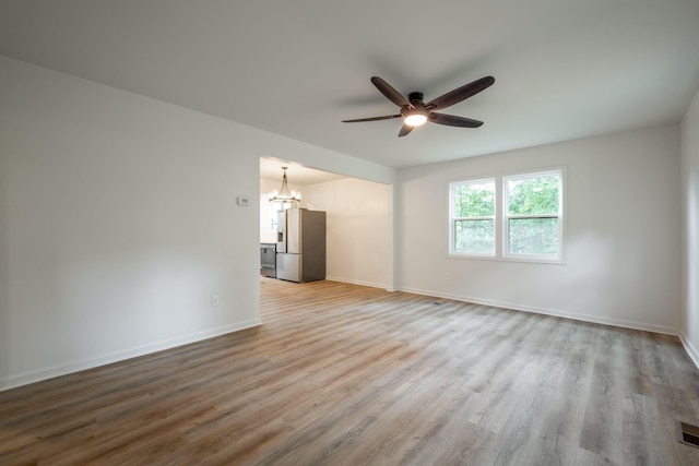 35 Agnes Ave, Chattanooga, TN 37406 - empty room featuring ceiling fan, a chandelier, and wood finished floors